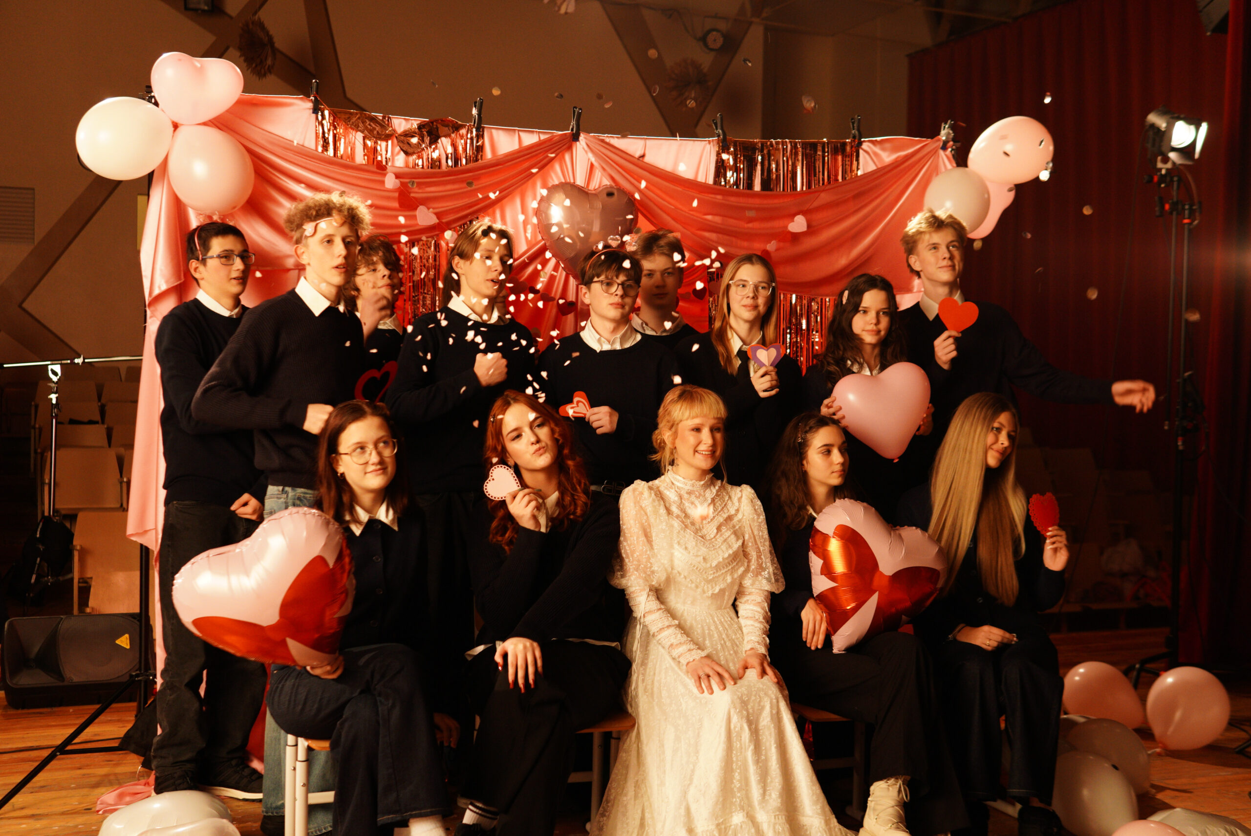 Cast gathering for the school photograph scene