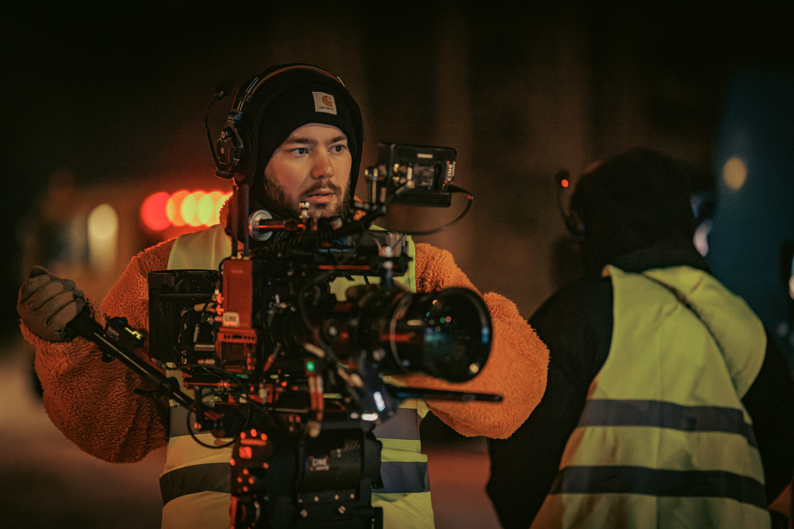 Camera operator preparing a winter night shot