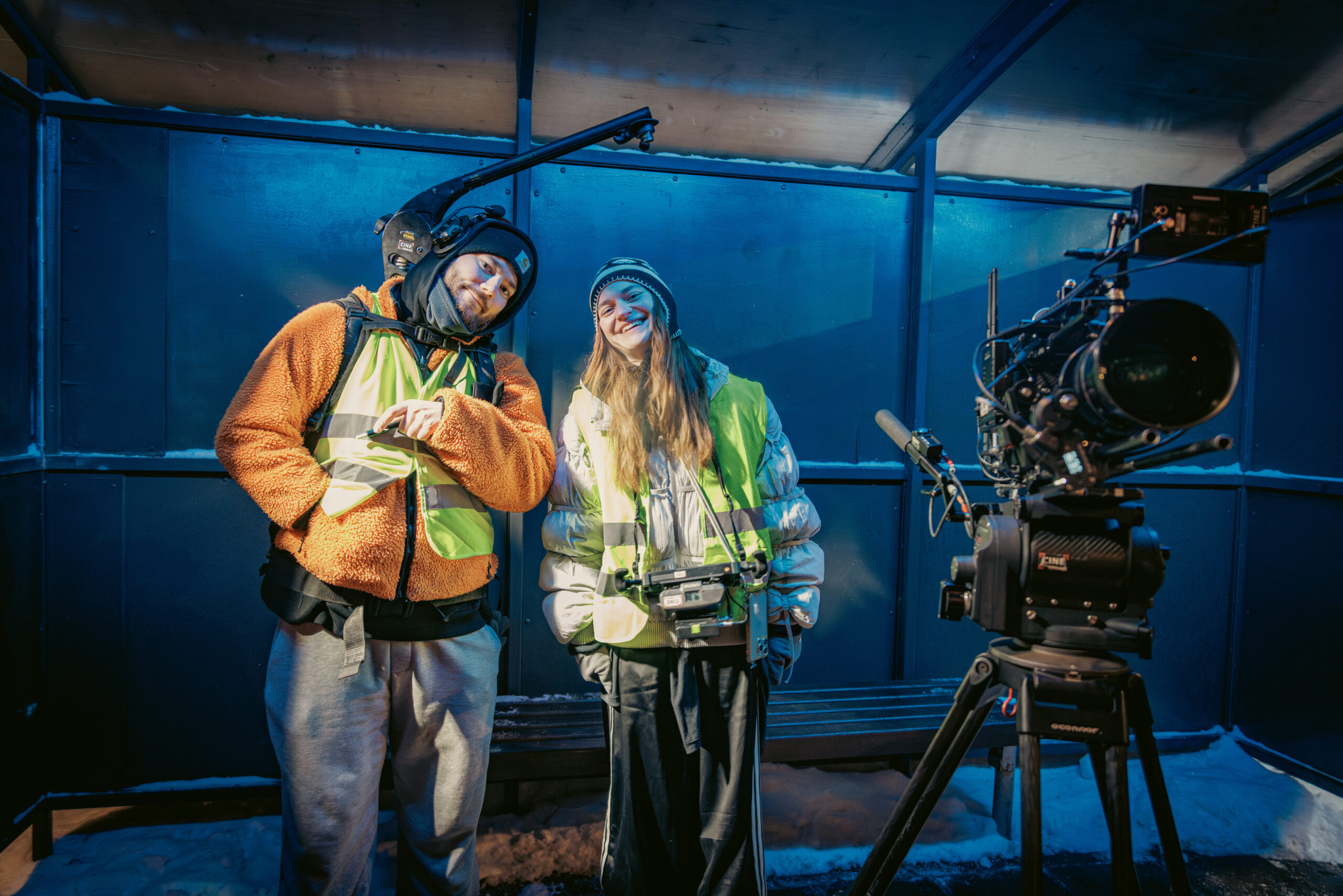 Camera crew between takes at the bus stop